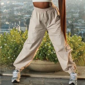 Beige, off white baggy, parachute style pants